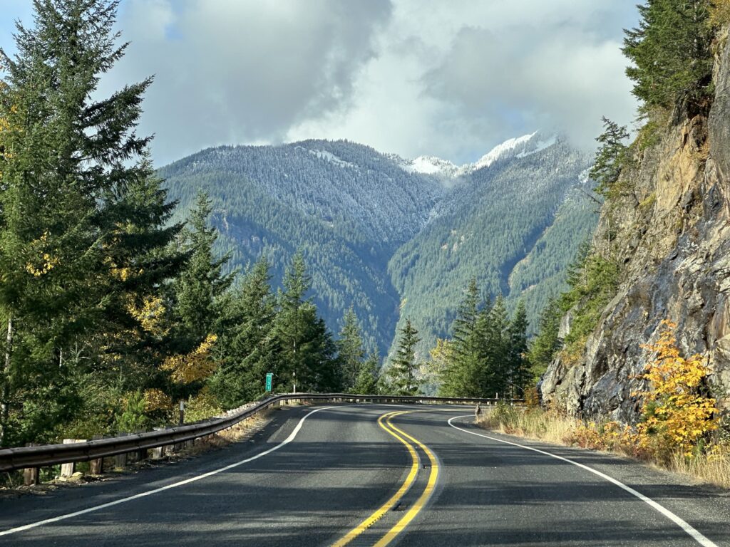 Scenic fall drive along Highway 20 with golden larches leading into the Methow Valley