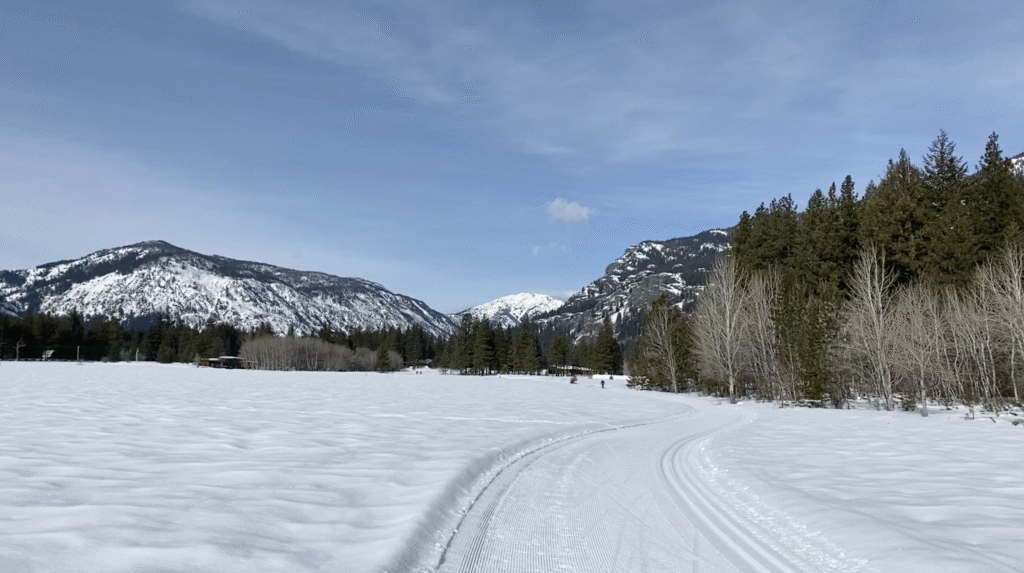 Snow-covered, freshly groomed Flagg Mountain Loop ski trail near the Mazama Store in Washington