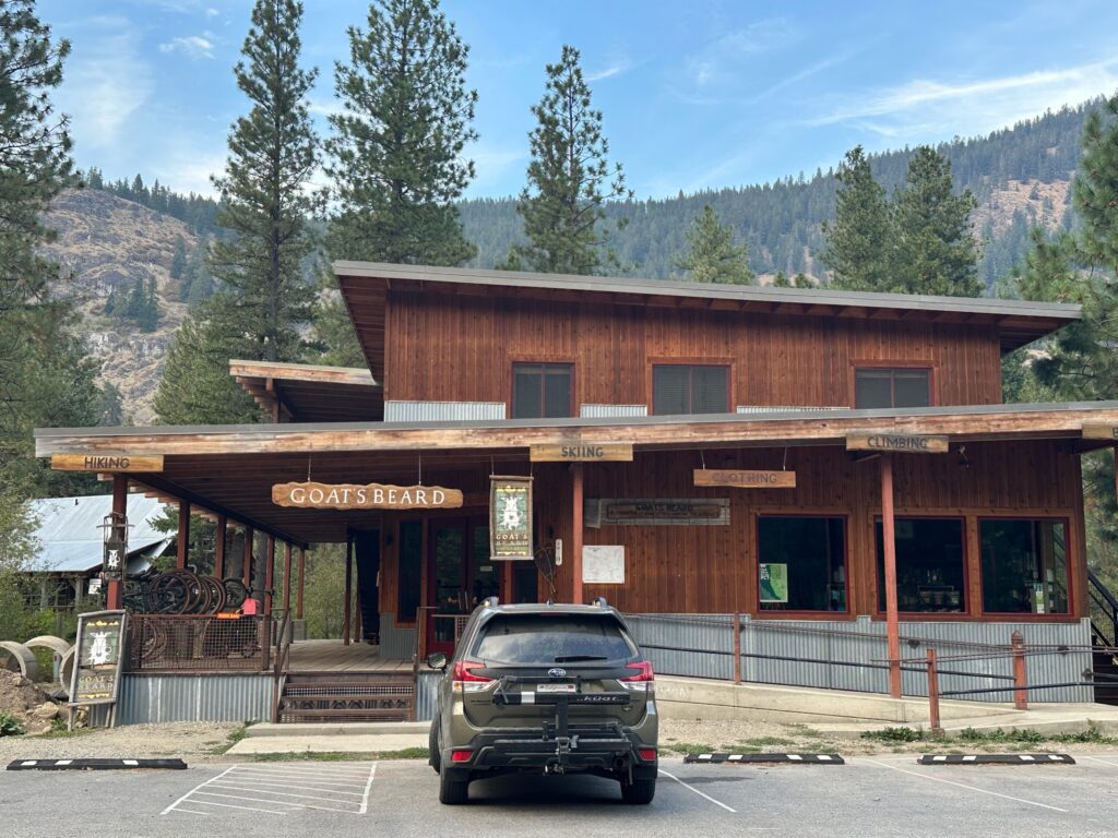 The Goat’s Beard Mountain Supplies shop in Mazama, Washington, with wooden façade and outdoor gear displays.